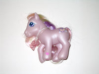 G3 My Little Pony:  1st Edition Fluttershy with Charm Necklace (2003)